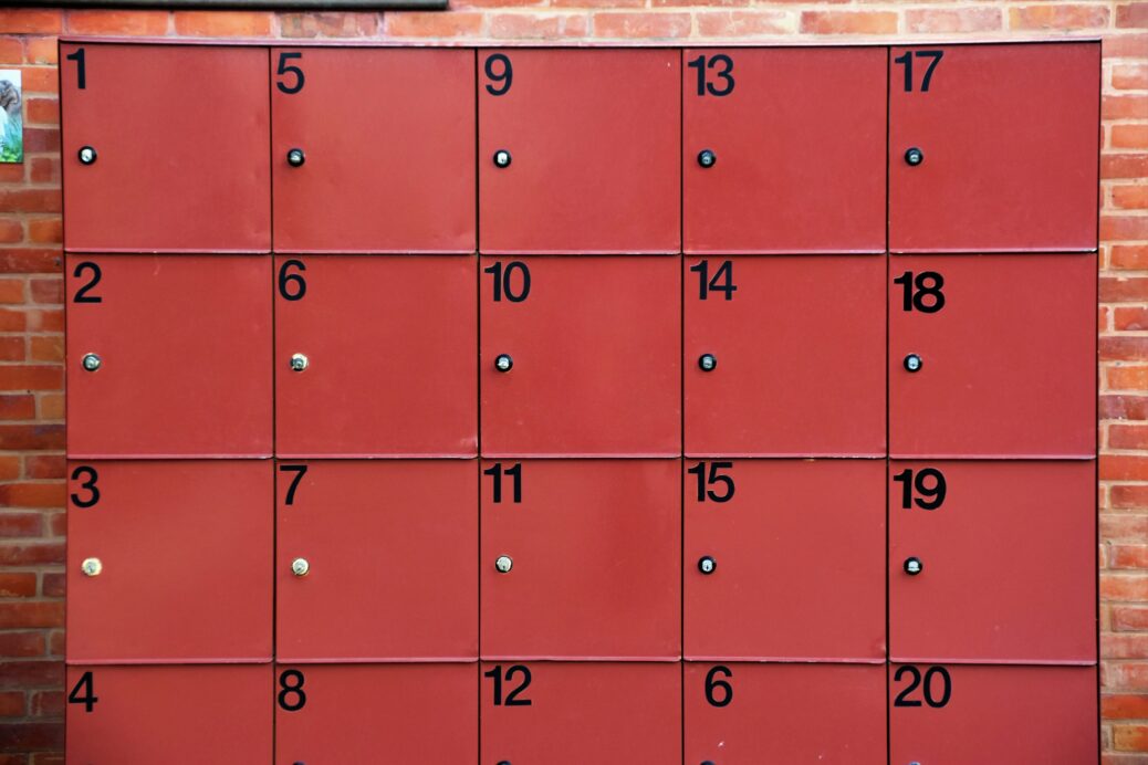 Red lockers with black numbers from 1 to 20